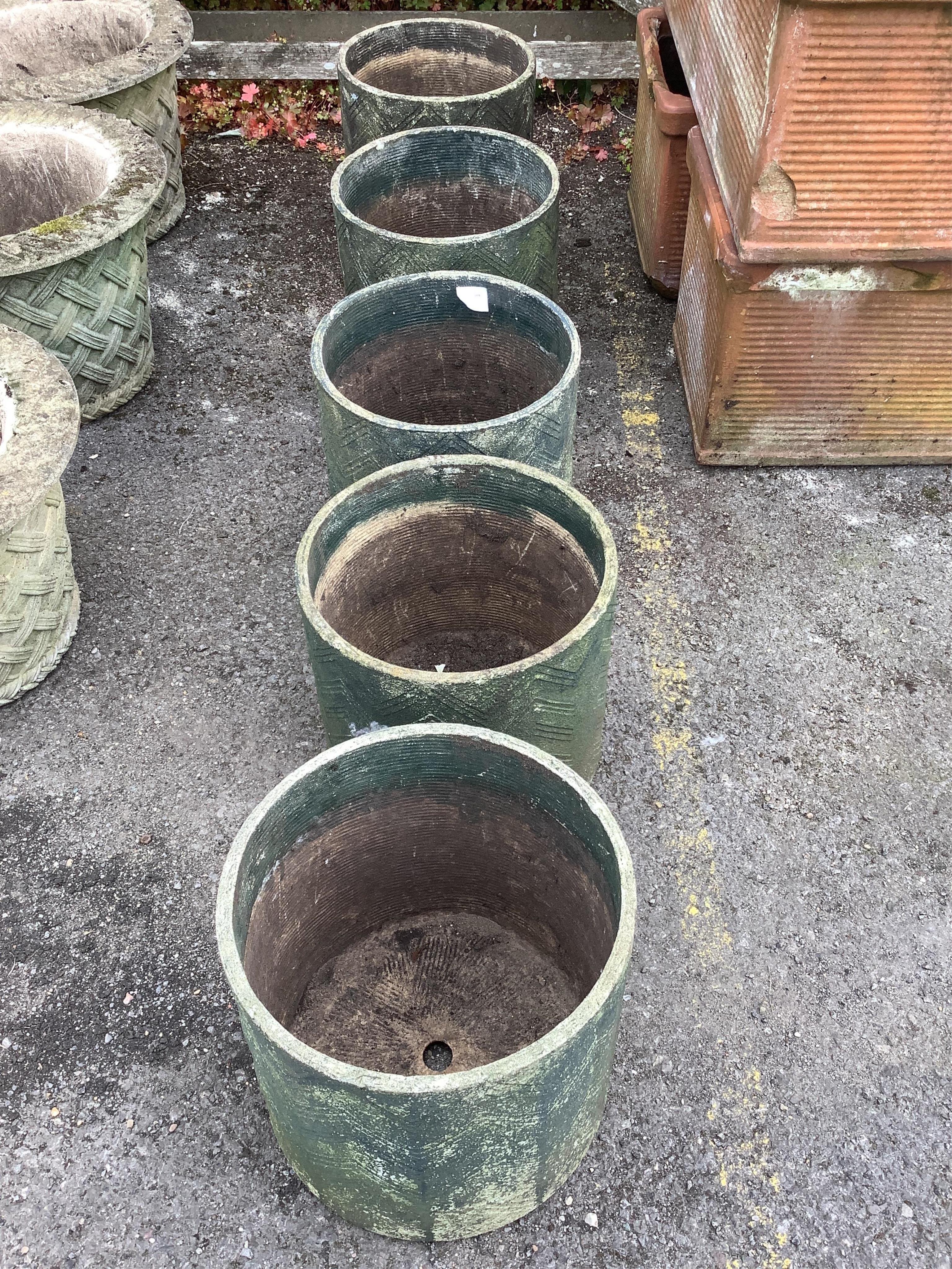 Five circular garden planters, diameter 32cm, height 31cm. Condition - poor